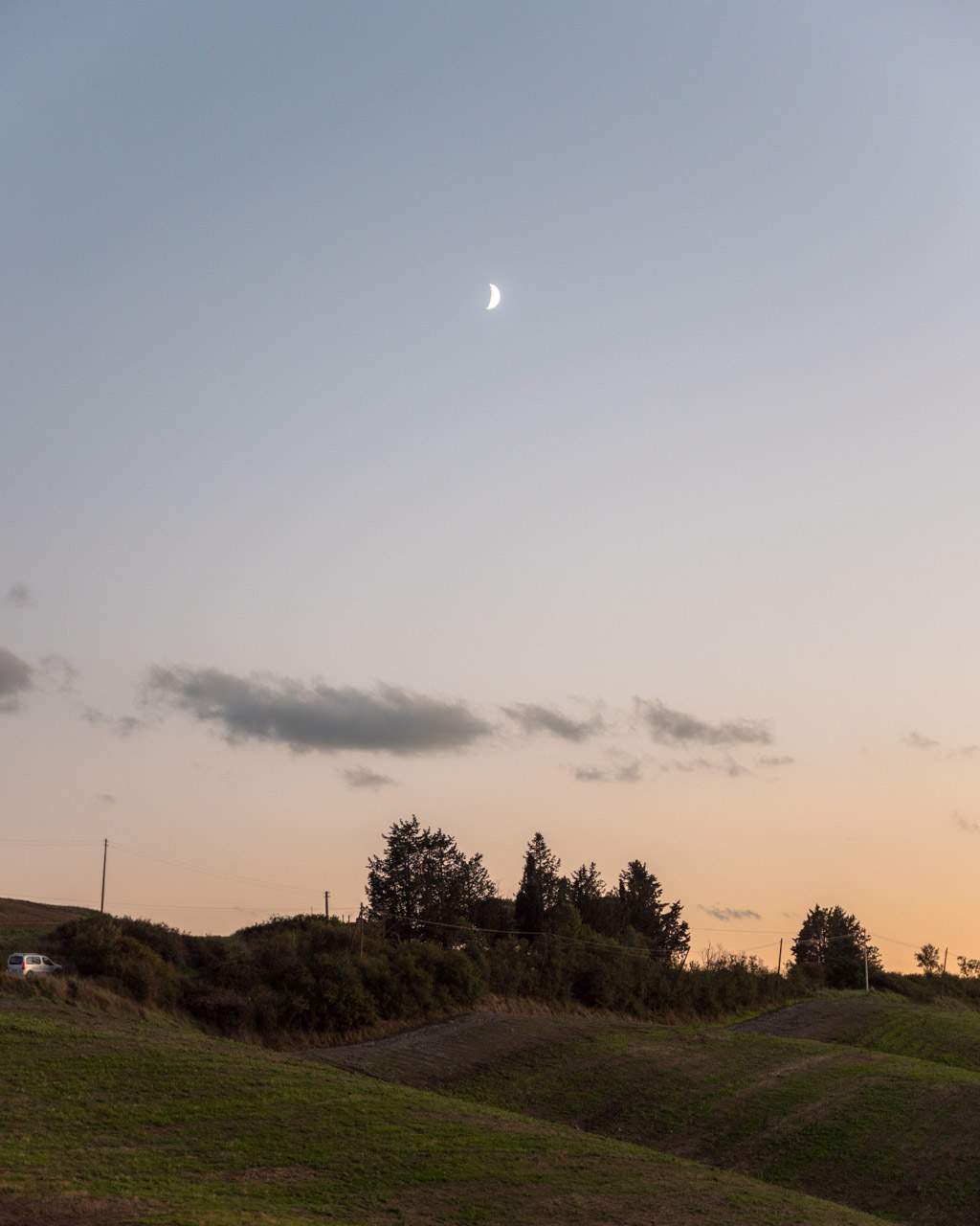 Moonrise at the sunset spot in Tuscany
