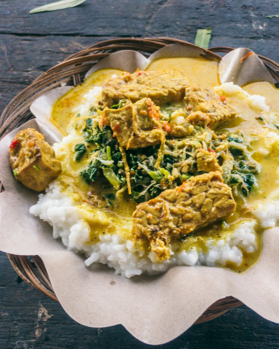 Rice, curry, urap, tempeh and tofu at a street stall