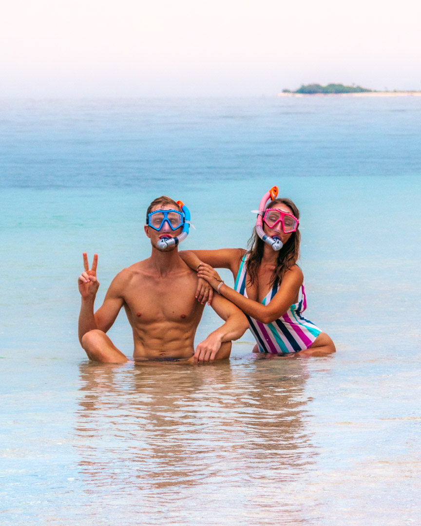 Alex and Victoria with snorkel masks in Indonesia